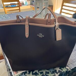 Coach tote lightly used.  No longer use.